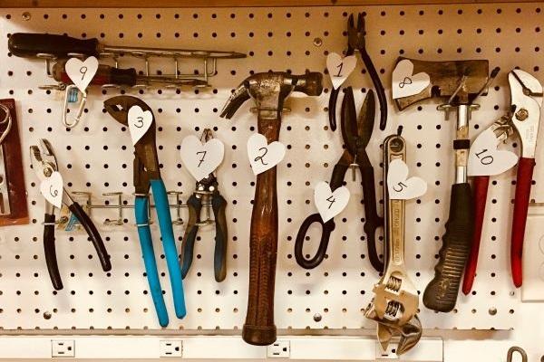 Tools hanging on a peg board
